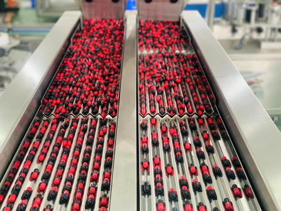 容量計数充填機、容量10～120本/分、機械重量320kg